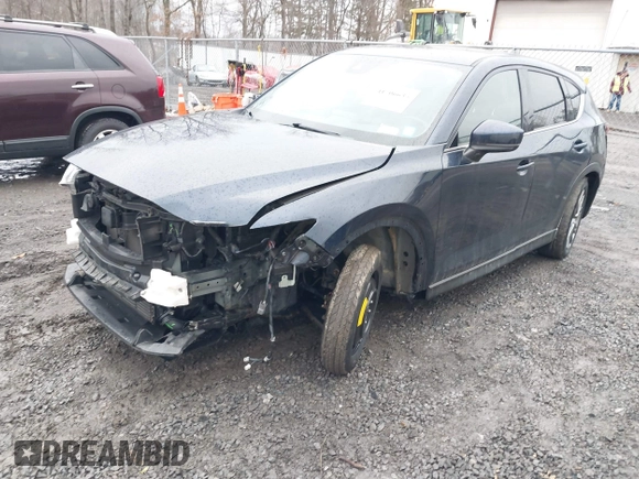 2019 Mazda CX-5 Signature with VIN JM3KFBEY4K0525171, listed as a IAAI auction lot 41706635 with 88,293 mi miles. Bid and sale history available at carsss.com. Image 17.
