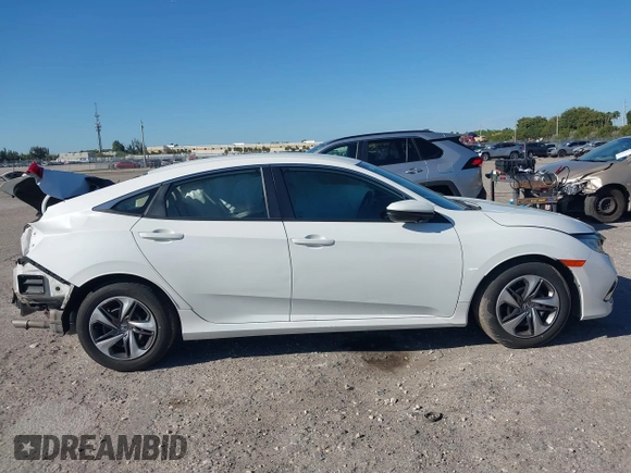 2020 Honda Civic LX z VIN 19XFC2F68LE206395, wystawiony jako IAAI lot #41720356 z przebiegiem 38 037 mil mil oraz . Historia ofert i sprzedaży dostępna na DreamBid. Obrazek 14.