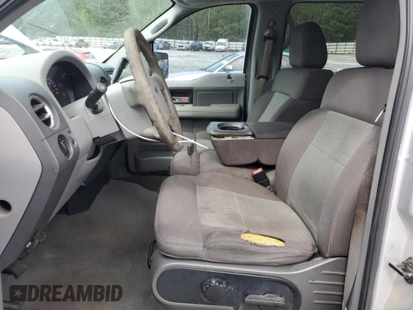 2005 Ford F-150 XLT with VIN 1FTRW12WX5FA79128, listed as a Copart auction lot 51963585 with 169,045 mi miles and Salvage Title. Bid and sale history available at carsss.com. Image 7.
