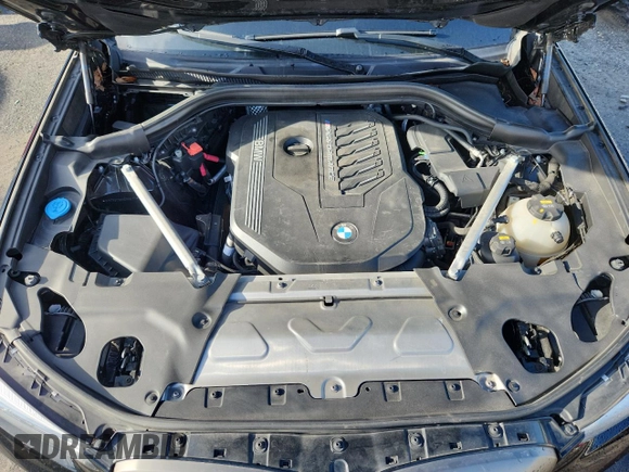 2021 BMW X4 M40i with VIN 5UX2V5C05M9F68427, listed as a Copart auction lot 64941095 with 50,208 mi miles and Salvage title. Bid and sale history available at DreamBid. Image 11.