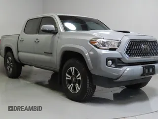 2019 Toyota Tacoma SR5 with VIN 3TMAZ5CN6KM106564, listed as a Copart auction lot 62170285 with 101,164 mi miles and Salvage title. Bid and sale history available at DreamBid. Image 1.