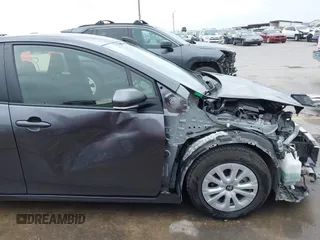 2022 Toyota Prius L Eco with VIN JTDKAMFU4N3183352, listed as a IAAI auction lot 42170623 with 52,244 mi miles and . Bid and sale history available at DreamBid. Image 18.