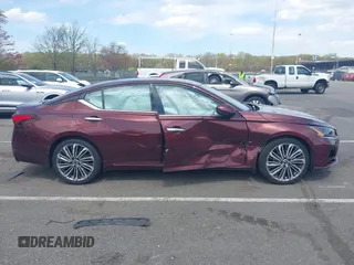 2023 Nissan Altima SL z VIN 1N4BL4EV6PN406475, wystawiony jako IAAI lot #42022515 z przebiegiem 23 641 mil mil oraz . Historia ofert i sprzedaży dostępna na DreamBid. Obrazek 13.