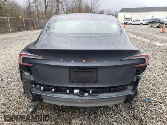 2024 Tesla Model 3 with VIN 5YJ3E1EA7RF858716, listed as a Copart auction lot 49809325 with 9,936 mi miles and Non Repairable. Bid and sale history available at DreamBid. Image 6.