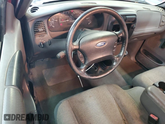 2001 Ford Ranger XL with VIN 1FTYR10C61TA40124, listed as a Copart auction lot 48943325 with 196,810 mi miles and Salvage title. Bid and sale history available at DreamBid. Image 8.