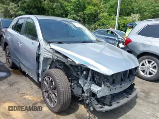 2016 Mazda CX-5 Grand Touring z VIN JM3KE4DY8G0678806, wystawiony jako IAAI lot #42173826 z przebiegiem 79 615 mil mil oraz . Historia ofert i sprzedaży dostępna na DreamBid. Obrazek 1.