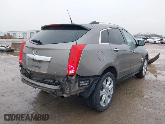 2011 Cadillac SRX Premium Collection with VIN 3GYFNFEY3BS610591, listed as a IAAI auction lot 41446148 with 147,959 mi miles. Bid and sale history available at carsss.com. Image 4.