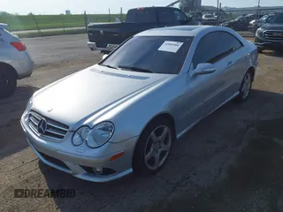 2007 Mercedes-Benz CLK-Class 5.5L with VIN WDBTJ72H97F209555, listed as a IAAI auction lot 42081006 with 137,436 mi miles. Bid and sale history available at carsss.com. Image 2.