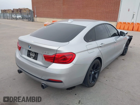 2018 BMW 4 Series 440i with VIN WBA4J5C57JBF07924, listed as a IAAI auction lot 41595682 with 75,121 mi miles and . Bid and sale history available at DreamBid. Image 4.