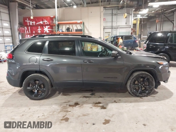 2016 Jeep Cherokee Latitude with VIN 1C4PJLCSXGW137190, listed as a IAAI auction lot 41563823 with 159,586 mi miles. Bid and sale history available at carsss.com. Image 14.