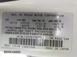 2013 Mazda 3 i Sport with VIN JM1BL1U71D1767742, listed as a IAAI auction lot 41961610 with 140,359 mi miles and . Bid and sale history available at carsss.com. Image 9.