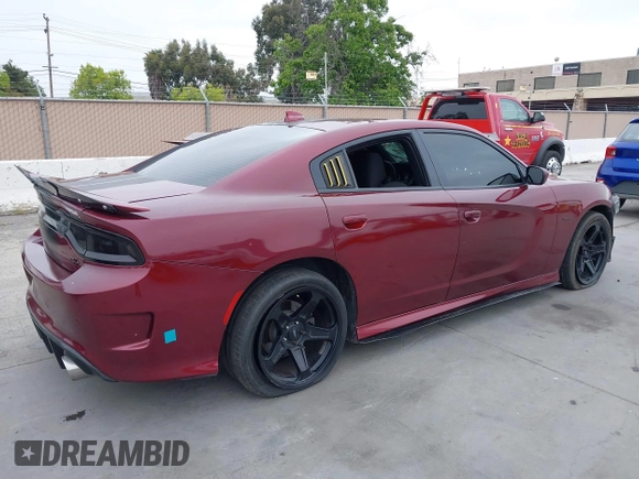 2019 Dodge Charger R/T with VIN 2C3CDXCT2KH749207, listed as a IAAI auction lot 42120658 with 52,330 mi miles and . Bid and sale history available at carsss.com. Image 4.