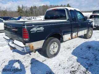 1998 Ford F-150 Standard with VIN 1FTZX18W6WNB19121, listed as a IAAI auction lot 41461736 with 149,257 mi miles. Bid and sale history available at carsss.com. Image 4.