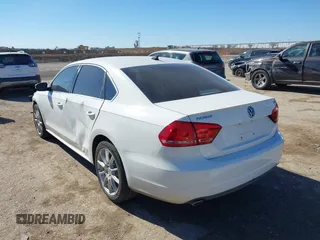 2014 Volkswagen Passat TDI SE w/Sunroof with VIN 1VWBN7A32EC016554, listed as a IAAI auction lot 41472156 with 178,149 mi miles. Bid and sale history available at carsss.com. Image 3.