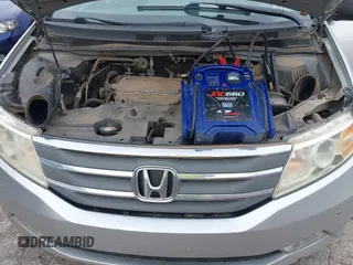 2011 Honda Odyssey Touring with VIN 5FNRL5H93BB071518, listed as a IAAI auction lot 42402421 with 227,647 mi miles and . Bid and sale history available at DreamBid. Image 10.