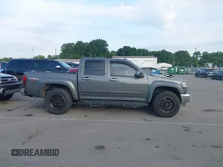 2012 GMC Canyon SLE1 with VIN 1GTH6MFE4C8128579, listed as a IAAI auction lot 42750181 with 250,960 mi miles and . Bid and sale history available at DreamBid. Image 13.