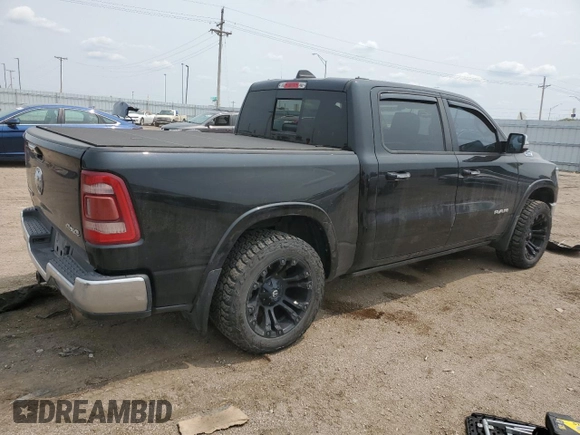 2019 Ram 1500 Laramie with VIN 1C6SRFJTXKN714855, listed as a Copart auction lot 58765625 with Not provided miles and Salvage title. Bid and sale history available at DreamBid. Image 3.