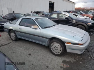 1986 Toyota Supra z VIN JT2MA70L4G0016772, wystawiony jako Copart lot #85806484 z przebiegiem 128 504 mil mil oraz Czysty tytuł • Clean title. Historia ofert i sprzedaży dostępna na DreamBid. Obrazek 4.