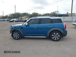 2017 MINI Countryman Cooper with VIN WMZYS7C3XH3E06893, listed as a IAAI auction lot 41729256 with 74,543 mi miles and . Bid and sale history available at DreamBid. Image 14.