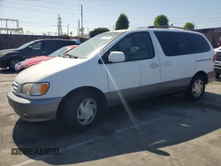 2001 Toyota Sienna LE with VIN 4T3ZF13C01U365938, listed as a Copart auction lot 60978605 with 86,138 mi miles and Salvage title. Bid and sale history available at DreamBid. Image 1.