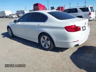 2013 BMW 5 Series 528i with VIN WBAXG5C59DDY32432, listed as a IAAI auction lot 41230673 with 103,069 mi miles and . Bid and sale history available at carsss.com. Image 3.