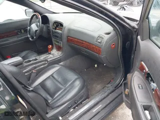 2002 Lincoln LS w/Base Pkg with VIN 1LNHM86S82Y701044, listed as a IAAI auction lot 41592614 with 192,902 mi miles. Bid and sale history available at carsss.com. Image 5.