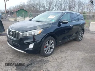 2016 Kia Sorento SX with VIN 5XYPKDA51GG073912, listed as a IAAI auction lot 42020501 with 172,836 mi miles. Bid and sale history available at carsss.com. Image 2.