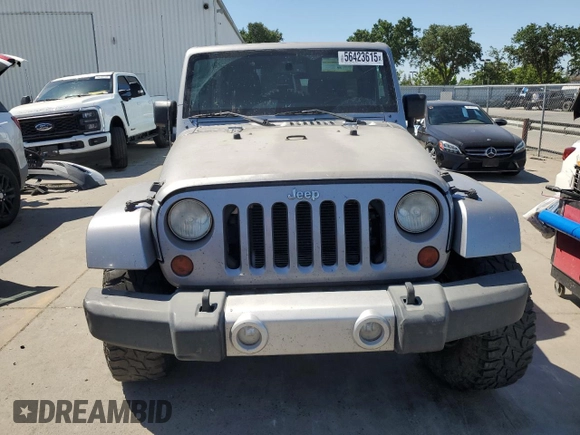 2013 Jeep Wrangler Unlimited Sahara with VIN 1C4BJWEG5DL662756, listed as a Copart auction lot 56423615 with 189,355 mi miles and Salvage title. Bid and sale history available at DreamBid. Image 5.
