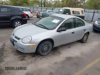 2005 Dodge Neon SE with VIN 1B3ES26C75D235588, listed as a IAAI auction lot 42094426 with 170,308 mi miles and . Bid and sale history available at carsss.com. Image 2.