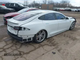 2012 Tesla Model S Performance with VIN 5YJSA1DP4CFP02346, listed as a IAAI auction lot 41642201 with Not Provided miles. Bid and sale history available at carsss.com. Image 4.