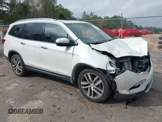 2017 Honda Pilot Elite with VIN 5FNYF6H04HB042192, listed as a IAAI auction lot 41780875 with 158,491 mi miles and . Bid and sale history available at DreamBid. Image 1.