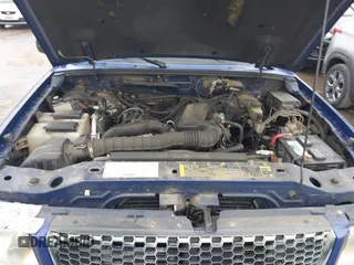 2003 Ford Ranger XL with VIN 1FTYR10U83PB84844, listed as a IAAI auction lot 42009030 with 141,215 mi miles. Bid and sale history available at carsss.com. Image 10.