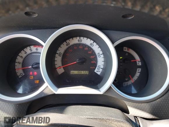2013 Toyota Tacoma with VIN 5TFUU4ENXDX082950, listed as a Copart auction lot 62703915 with 166,733 mi miles and Salvage title. Bid and sale history available at DreamBid. Image 9.