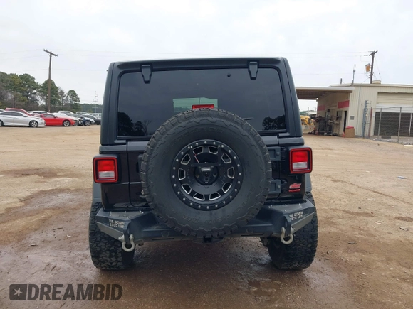 2018 Jeep Wrangler Unlimited Sport with VIN 1C4HJXDN6JW190027, listed as a IAAI auction lot 41351708 with 59,315 mi miles and . Bid and sale history available at DreamBid. Image 16.