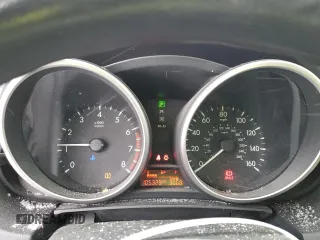 2014 Mazda 5 Sport with VIN JM1CW2BL5E0172739, listed as a Copart auction lot 37702334 with 105,329 mi miles and Salvage Title. Bid and sale history available at DreamBid. Image 9.
