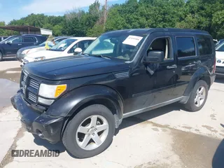 2010 Dodge Nitro SXT z VIN 1D4PT5GK2AW104047, wystawiony jako IAAI lot #42454184 z przebiegiem 132 041 mil mil oraz . Historia ofert i sprzedaży dostępna na DreamBid. Obrazek 2.