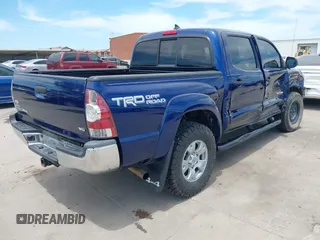 2014 Toyota Tacoma with VIN 3TMLU4EN6EM148851, listed as a IAAI auction lot 42307954 with 71,784 mi miles and . Bid and sale history available at DreamBid. Image 4.