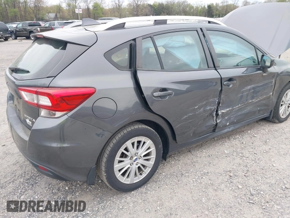2018 Subaru Impreza Premium z VIN 4S3GTAD61J3703780, wystawiony jako IAAI lot #42081604 z przebiegiem 79 757 mil mil oraz . Historia ofert i sprzedaży dostępna na DreamBid. Obrazek 4.