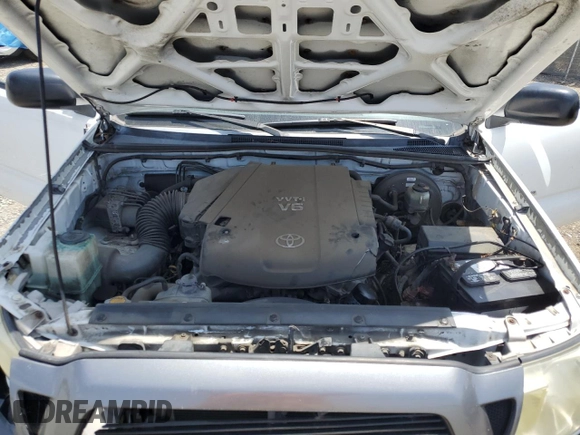2010 Toyota Tacoma with VIN 3TMLU4EN6AM041048, listed as a Copart auction lot 61290985 with 199,384 mi miles and Salvage title. Bid and sale history available at DreamBid. Image 11.