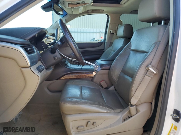 2015 Chevrolet Tahoe LTZ with VIN 1GNSKCKC9FR666040, listed as a Copart auction lot 44431875 with 233,166 mi miles and Salvage Title. Bid and sale history available at carsss.com. Image 7.