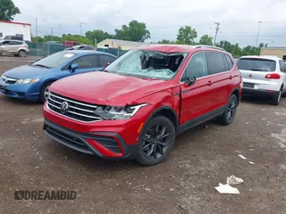 2022 Volkswagen Tiguan SE z VIN 3VV2B7AX0NM020942, wystawiony jako IAAI lot #42475302 z przebiegiem 26 353 mil mil oraz . Historia ofert i sprzedaży dostępna na DreamBid. Obrazek 17.