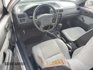 1996 Toyota Tercel DX z VIN JT2AC52L9T0189356, wystawiony jako Copart lot #75311564 z przebiegiem 155 248 mil mil oraz Szkody całkowita. Historia ofert i sprzedaży dostępna na DreamBid. Obrazek 8.