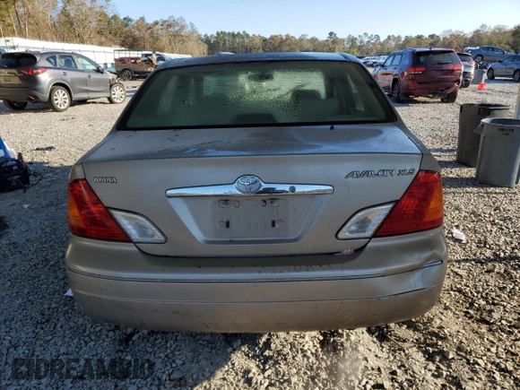 2000 Toyota Avalon XL z VIN 4T1BF28B2YU079163, wystawiony jako Copart lot #50129935 z przebiegiem 311 916 mil mil oraz Nie do naprawy • Non repairable. Historia ofert i sprzedaży dostępna na DreamBid. Obrazek 6.