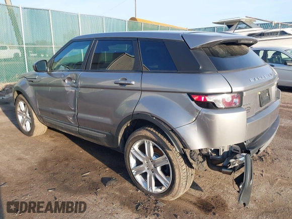 2014 Land Rover Range Rover Evoque Pure Plus z VIN SALVP2BG0EH863440, wystawiony jako IAAI lot #41760065 z przebiegiem 136 997 mil mil oraz . Historia ofert i sprzedaży dostępna na DreamBid. Obrazek 3.