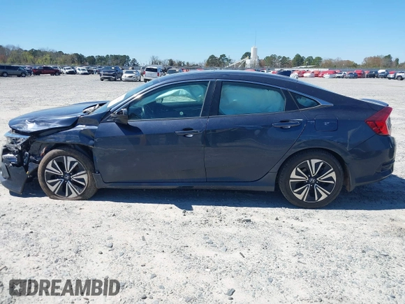 2016 Honda Civic EX-L with VIN 19XFC1F72GE044319, listed as a IAAI auction lot 41823220 with 129,868 mi miles and . Bid and sale history available at DreamBid. Image 14.