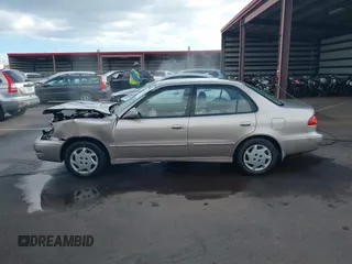 1999 Toyota Corolla VE with VIN 1NXBR12E4XZ182751, listed as a IAAI auction lot 41433066 with 56,904 mi miles and . Bid and sale history available at DreamBid. Image 14.