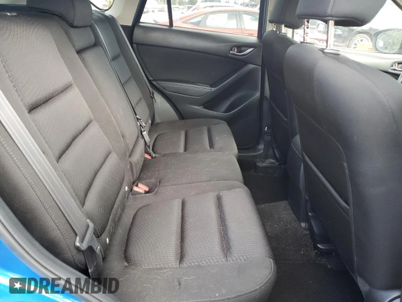 2014 Mazda CX-5 Touring with VIN JM3KE4CY3E0381134, listed as a Copart auction lot 52115015 with 52,162 mi miles and Salvage Title. Bid and sale history available at carsss.com. Image 11.