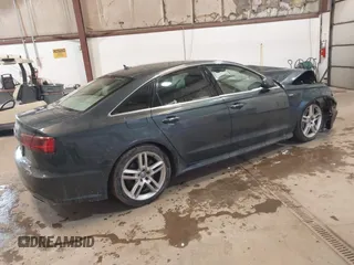 2016 Audi A6 2.0T Premium Plus with VIN WAUGFAFC8GN088505, listed as a IAAI auction lot 41569043 with 98,528 mi miles. Bid and sale history available at carsss.com. Image 4.