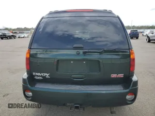 2003 GMC Envoy SLT z VIN 1GKET16P936191818, wystawiony jako Copart lot #53270645 z przebiegiem 130 357 mil mil oraz Szkody całkowita. Historia ofert i sprzedaży dostępna na DreamBid. Obrazek 6.