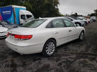 2010 Hyundai Azera GLS z VIN KMHFC4DD4AA513796, wystawiony jako Copart lot #59782965 z przebiegiem 56 958 mil mil oraz Szkoda całkowita • Salvage title. Historia ofert i sprzedaży dostępna na DreamBid. Obrazek 3.
